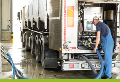 Unloading milk at factory Unloading milk at factory